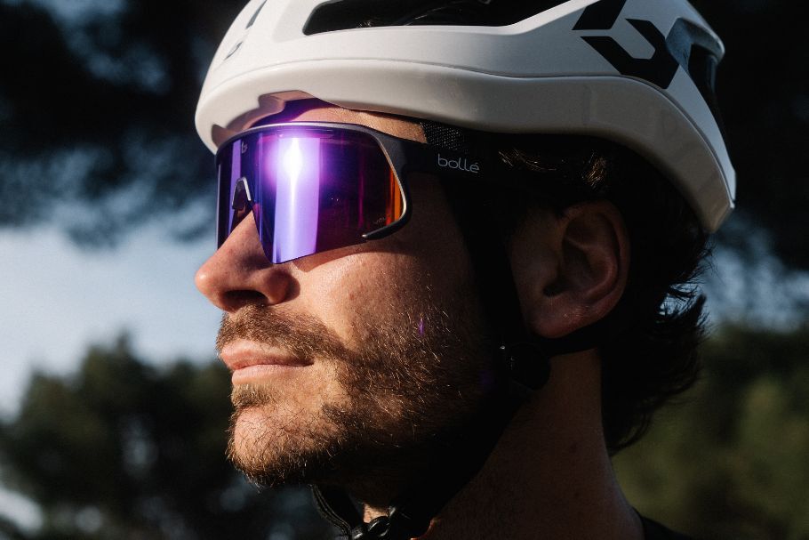 Person wearing VOLT high contrast enhanced colour lens sunglasses outdoors
