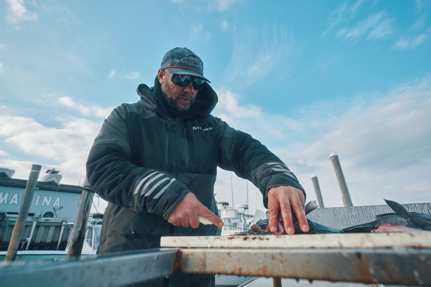 Rob Radloff wearing SPY MAINLINE while inshore fishing in New Jersey